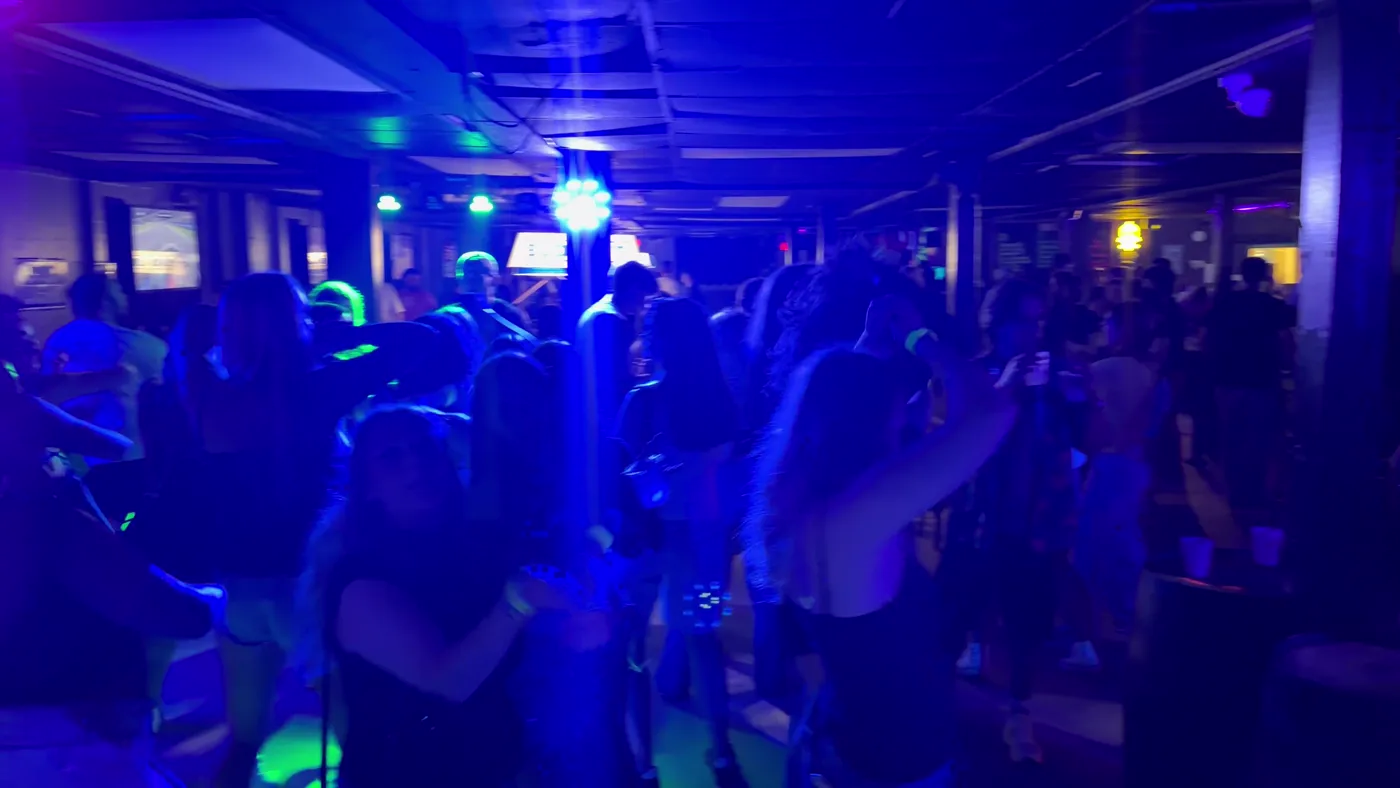 Crowd gathered for karaoke night inside Greene Street Pool Tavern.
